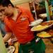 Cancun Mexican Grill server Cesa Ramirez  balances plates as he waits on customers at the Saline restaurant on  Friday, May 31, 2013. Melanie Maxwell | AnnArbor.com